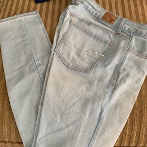 Light denim skinny jeans